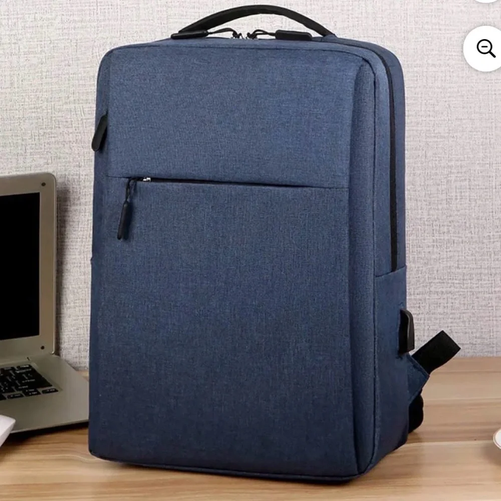 Stylish Blue Laptop Backpack with USB Charging Cable